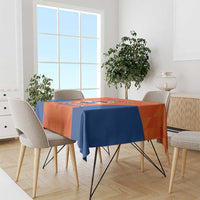 Orange and blue Netherlands baseball tablecloth with crest graphic draped over table