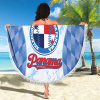 Round beach blanket held up: blue check sides and central Panama baseball logo, fringe