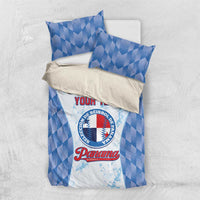Blue baseball-themed bedding set with comforter and two pillow shams, central logo