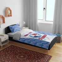 Blue baseball-themed bedding set on bed with comforter and two pillow shams