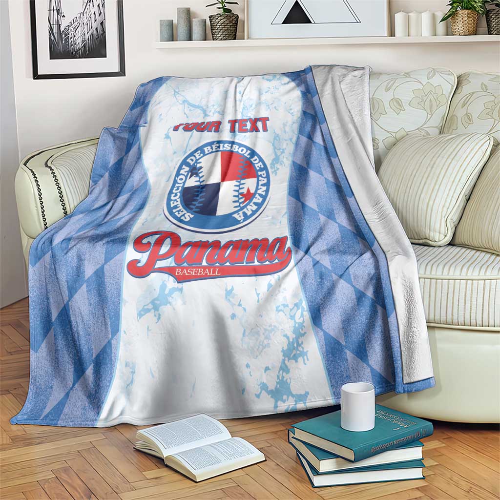 Custom baseball blanket with blue check border and Panama logo, draped on couch