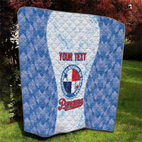 Blue and white quilt blanket with custom text and baseball emblem, shown flat outdoors