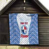 Folded blue and white quilt with quilted texture, baseball emblem and custom text