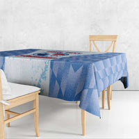 Blue checker tablecloth with side drape and bold geometric pattern