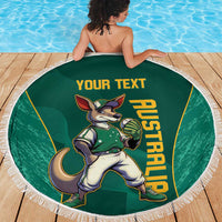 Green round beach blanket with white fringe and kangaroo mascot logo, 'YOUR TEXT'