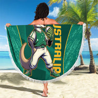Green round beach blanket with white fringe and kangaroo mascot holding a ball