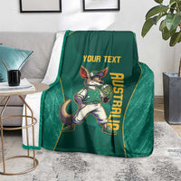 Green blanket with kangaroo mascot and custom text, vertical AUSTRALIA print, on sofa