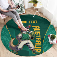 Round green rug with kangaroo mascot and 'YOUR TEXT' lettering, shown with feet above