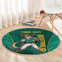 Round green rug with kangaroo mascot graphic and yellow 'YOUR TEXT' text across center