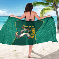 Green custom sarong with kangaroo mascot and vertical 'AUSTRALIA' print, held open