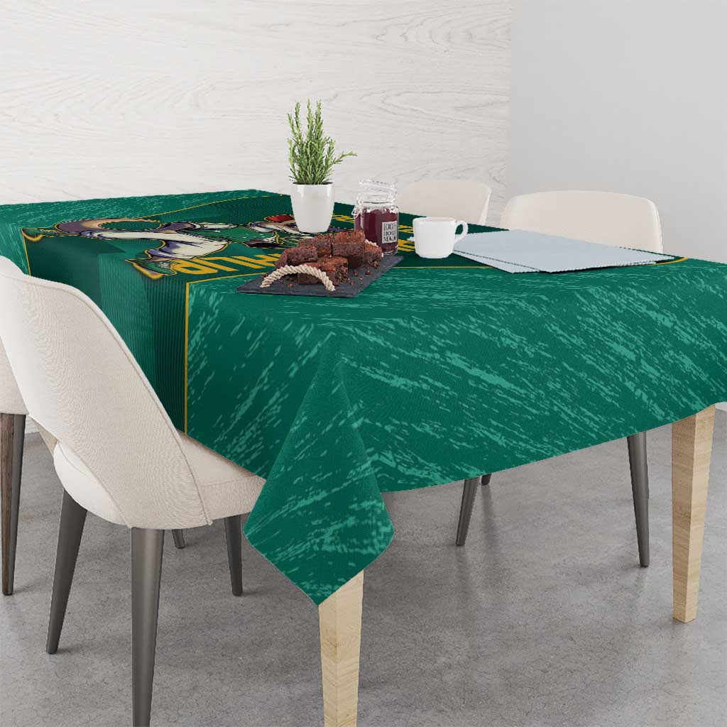 Green tablecloth with kangaroo mascot graphic and gold piping