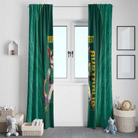 Pair of green window curtains with kangaroo mascot print and yellow custom text, full view.
