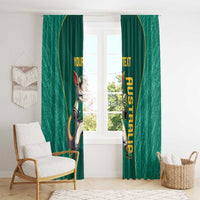 Green window curtains with kangaroo mascot and yellow custom text, shown in a living room.