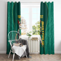 Green window curtain set with kangaroo mascot and vertical yellow custom text, framed by window.