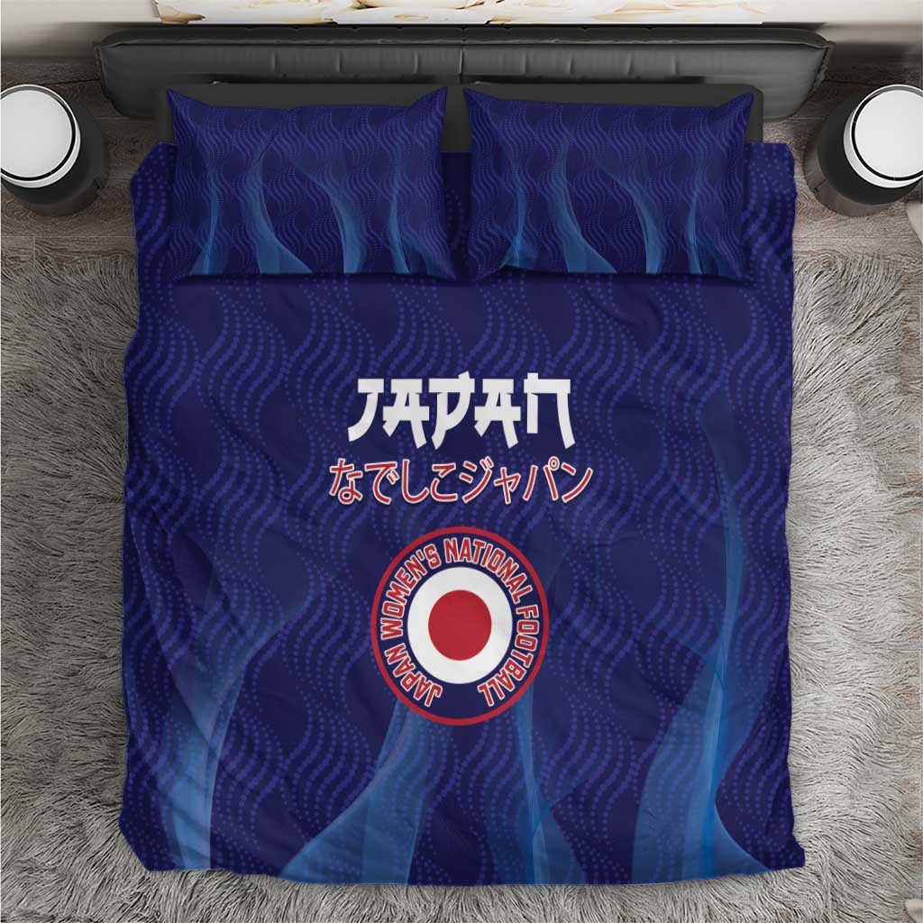 Blue duvet cover bedding set with matching pillowcases and circular emblem graphic