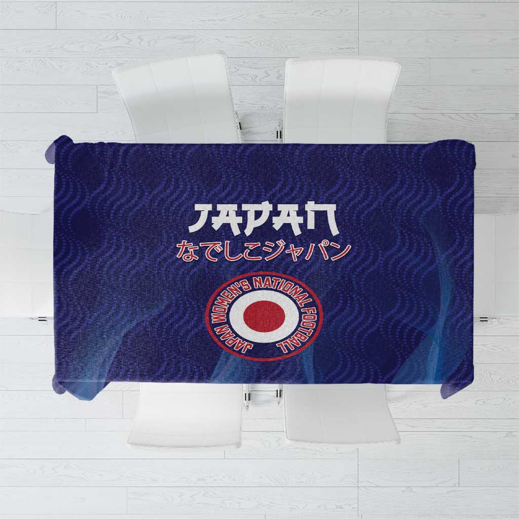 Blue football tablecloth with circular emblem and Japanese text, laid on table