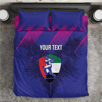 Blue custom cricket bedding set with magenta stripes, shield graphic, and 'YOUR TEXT' center.