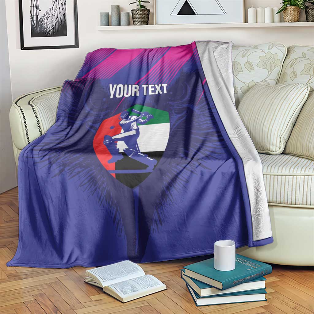 Blue and pink cricket blanket with UAE falcon shield graphic and placeholder 'YOUR TEXT'