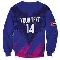 Unisex blue cricket sweatshirt back with YOUR TEXT 14, UAE flag patch on sleeve