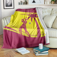 Custom cricket blanket in maroon and yellow with bold West Indies graphic, draped on sofa