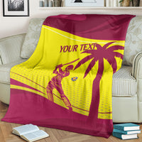 Custom cricket blanket in maroon and yellow with West Indies pattern, spread over sofa