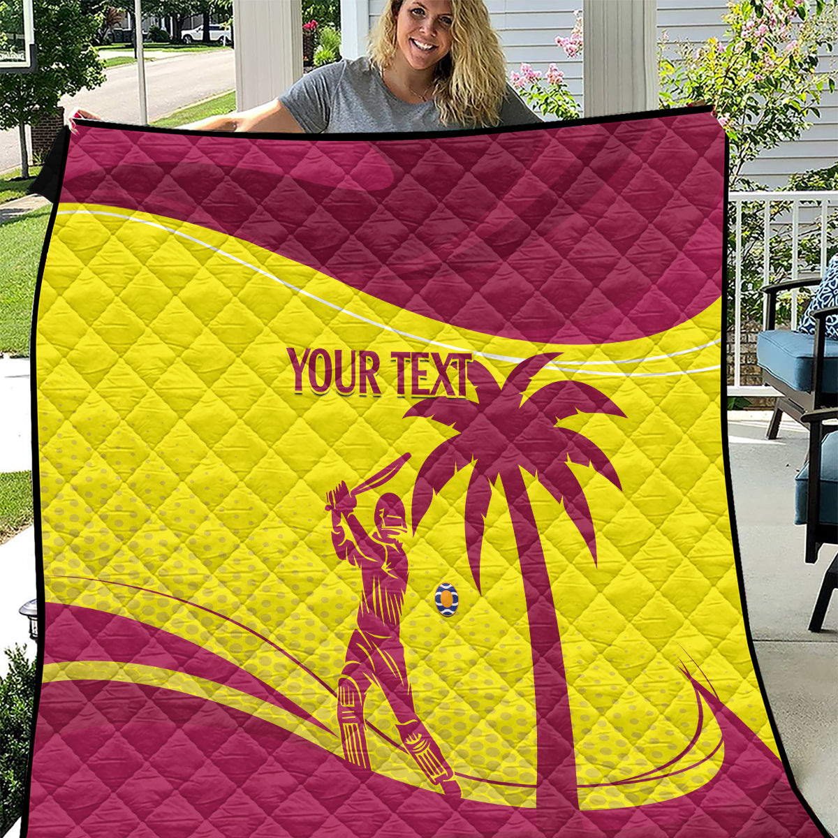 Custom cricket quilt in maroon and yellow with diamond stitching and West Indies emblem