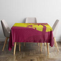 Custom cricket tablecloth, maroon fabric with yellow graphic panel on tabletop