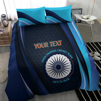Blue cricket bedding set with navy emblem circle and teal stripe accents on duvet
