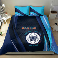 Blue cricket bedding set featuring round team emblem and curved stripe pattern on duvet