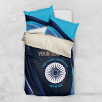 Navy and teal cricket bedding set with pillowcases and round team emblem on duvet
