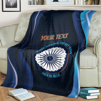 Folded dark blue cricket blanket with India emblem and 'YOUR TEXT', men in blue