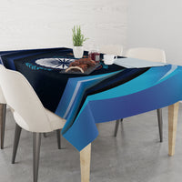 Blue cricket tablecloth with dark navy and teal stripes and central circular logo.
