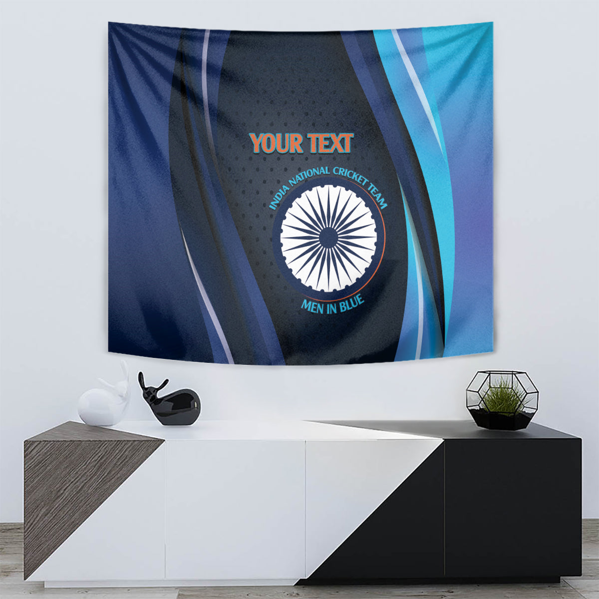 Blue cricket tapestry showing circular India emblem and orange 'YOUR TEXT' title