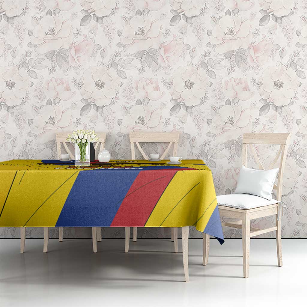 Yellow Colombia-themed tablecloth with blue and red stripes across the tabletop