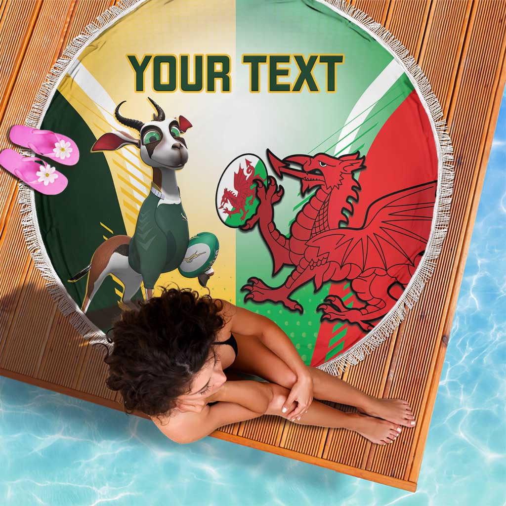 Round beach blanket with fringe, green yellow red crests and 'YOUR TEXT' sports design