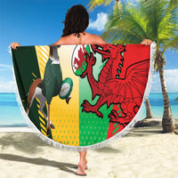 Round beach blanket with fringe, green yellow red crests and 'YOUR TEXT' sports motif
