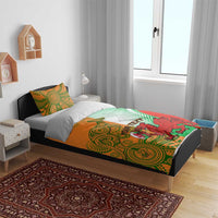 Rugby bedding set: green and orange tribal duvet with red dragon graphic and 2 pillowcases
