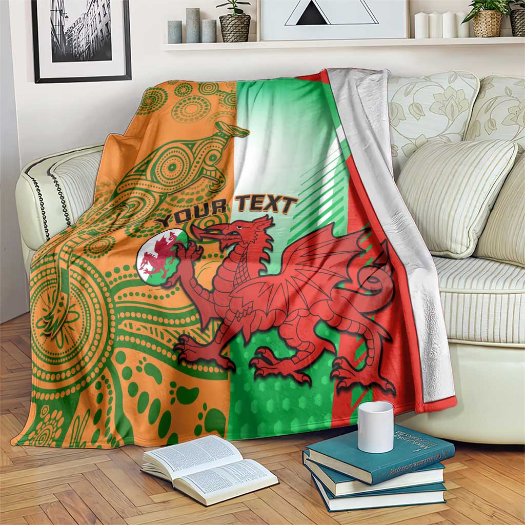 Rugby blanket with green, red, and orange panels featuring a red dragon mascot graphic.