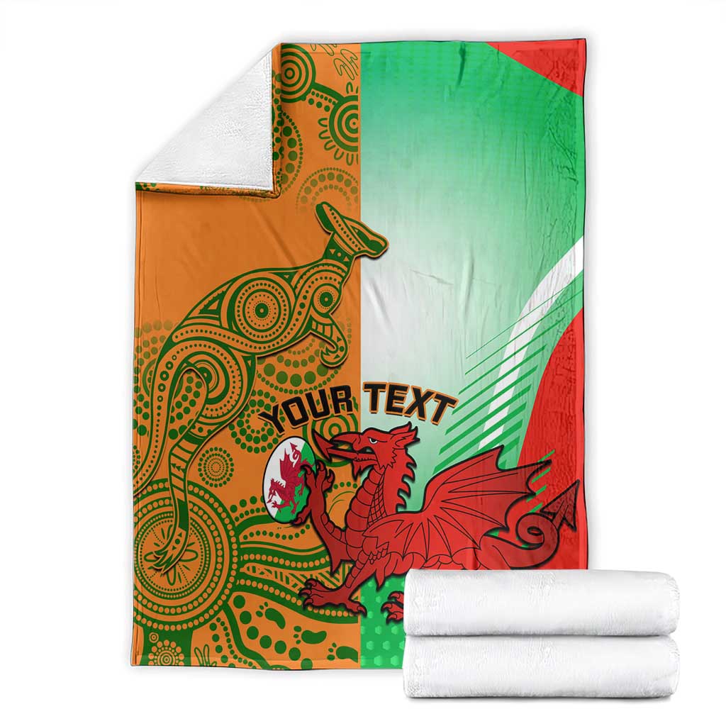 Rugby blanket with green, red, and orange design, mascot crest, and bold “YOUR TEXT” strip.