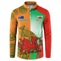 Rugby button sweatshirt with Australia and Wales logos, green red yellow pattern and placket