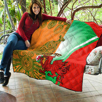 Quilt blanket held up indoors with red, green, white, and orange panels; kangaroo and custom text