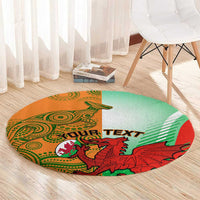 Round rug with green and orange tribal artwork, red dragon and centered 'YOUR TEXT' graphic