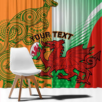 Rugby window curtain close-up, orange swirl print and green-red dragon with custom text