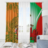 Rugby window curtain set on rods, sheer white center with orange and green-red panels