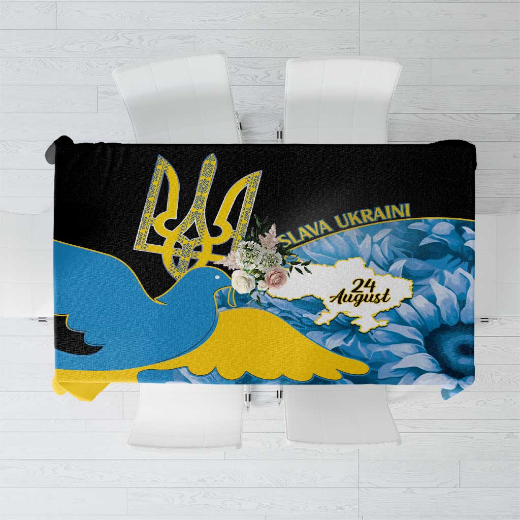 Black tablecloth with blue floral print, gold trident and Slava Ukraini text