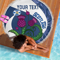 Round beach blanket with 'YOUR TEXT' and Scottish crest, purple flowers and green vine, fringe
