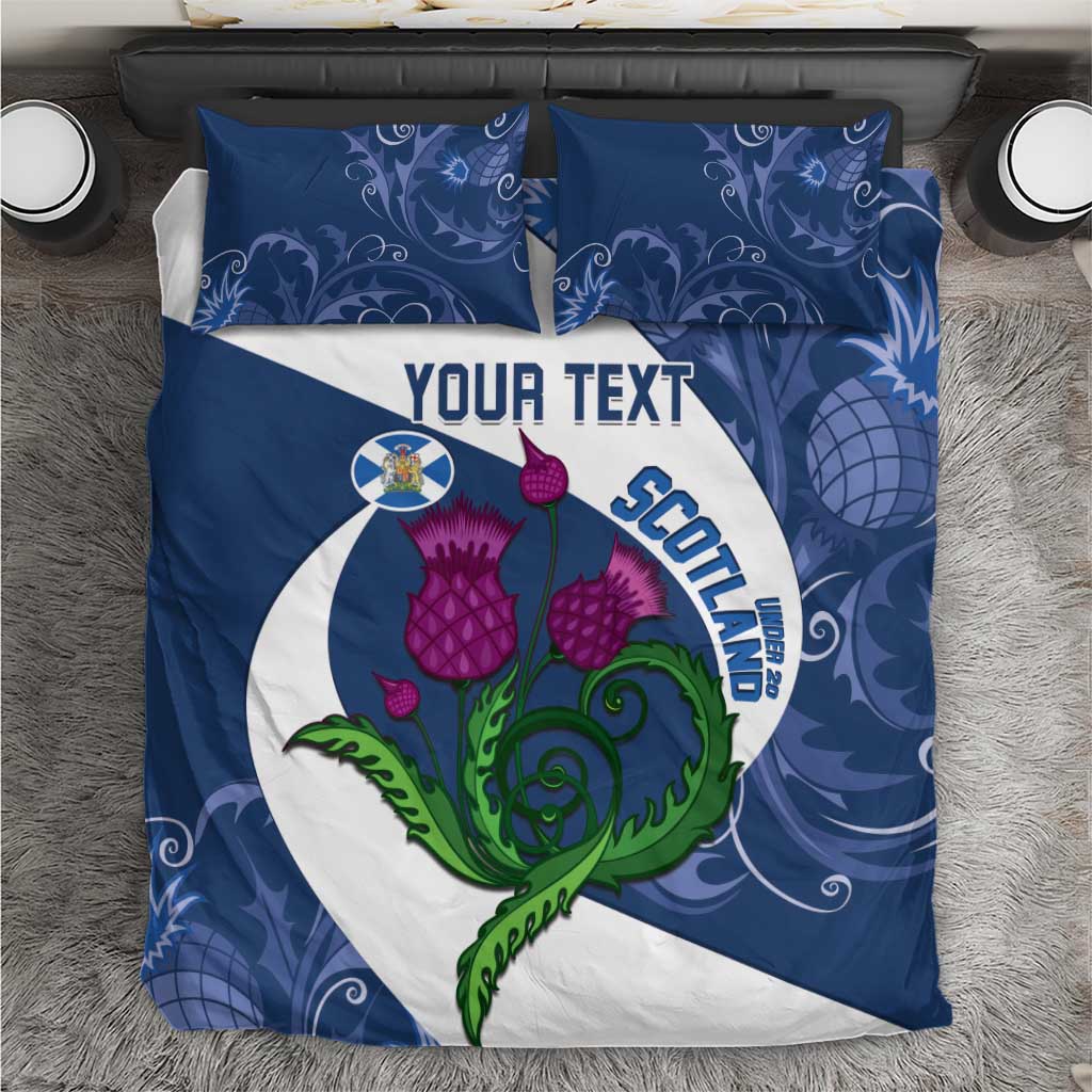 Blue duvet and pillowcase set with Scotland thistle emblem and decorative swirls
