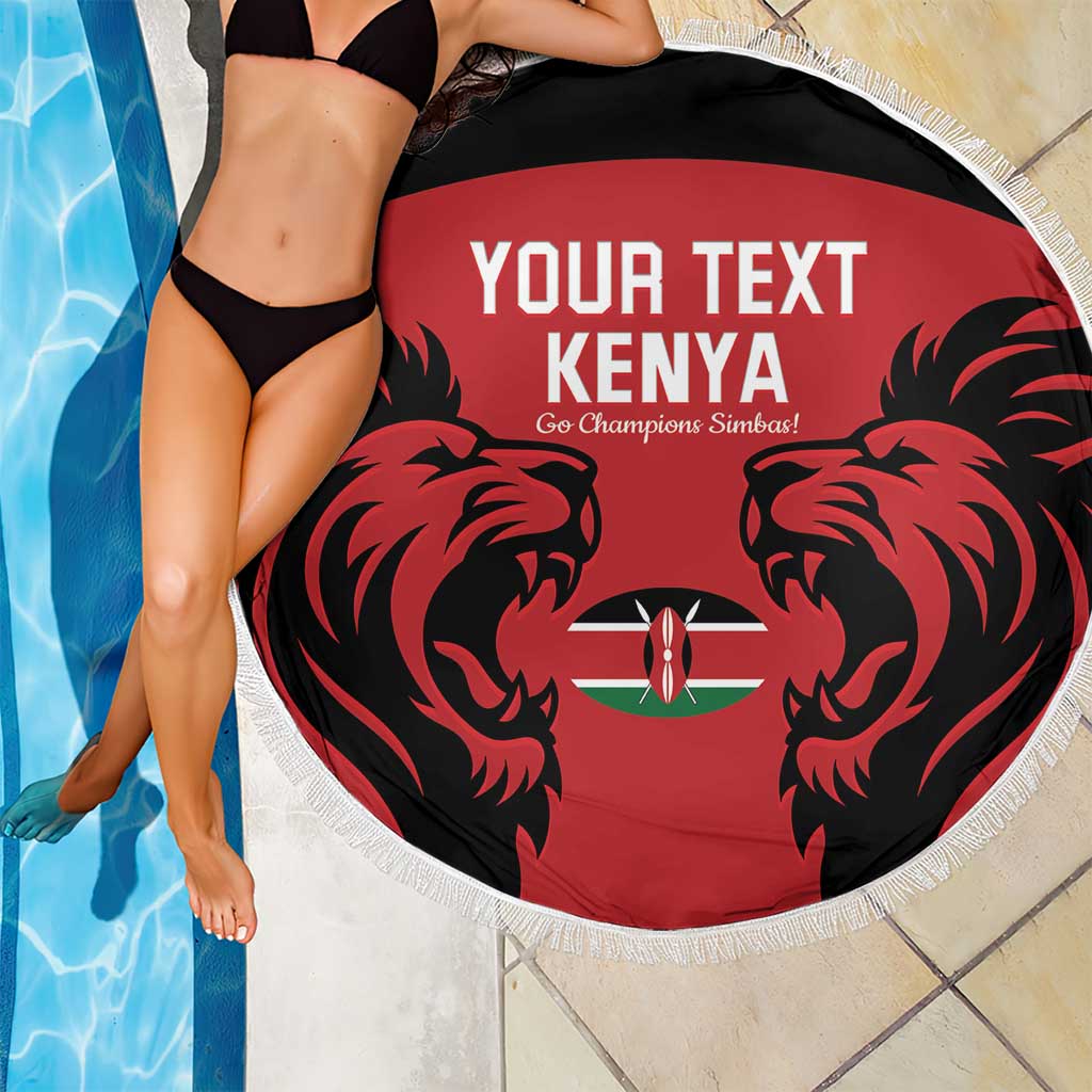 Red round beach blanket with black lion design, Kenya emblem, and white fringed border