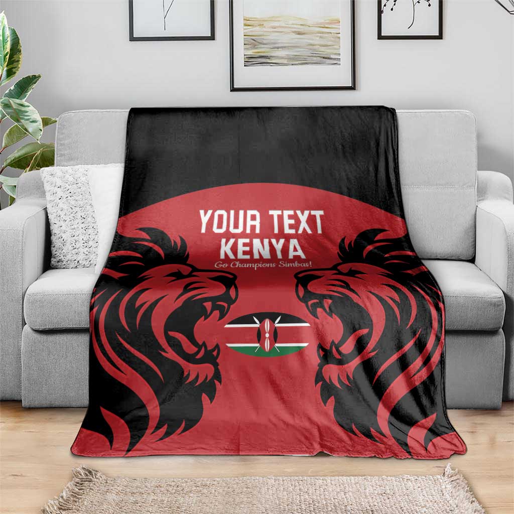 Kenya rugby blanket draped on a sofa: red panel with black lion graphic and "YOUR TEXT KENYA"