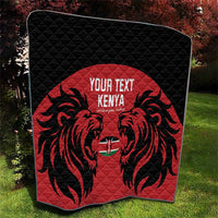 Red and black quilt on display with lion emblem and "YOUR TEXT KENYA" text
